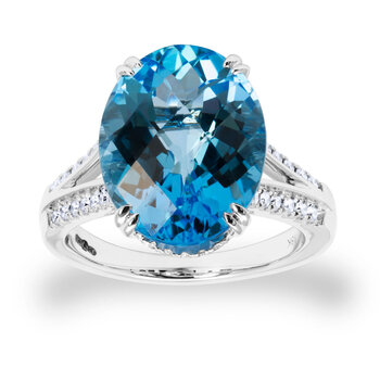 Oval Cut Blue Topaz & 0.28ctw Diamond Ring, 18ct White Gold