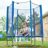 Lifestyle image of a child climbing out of the trampoline