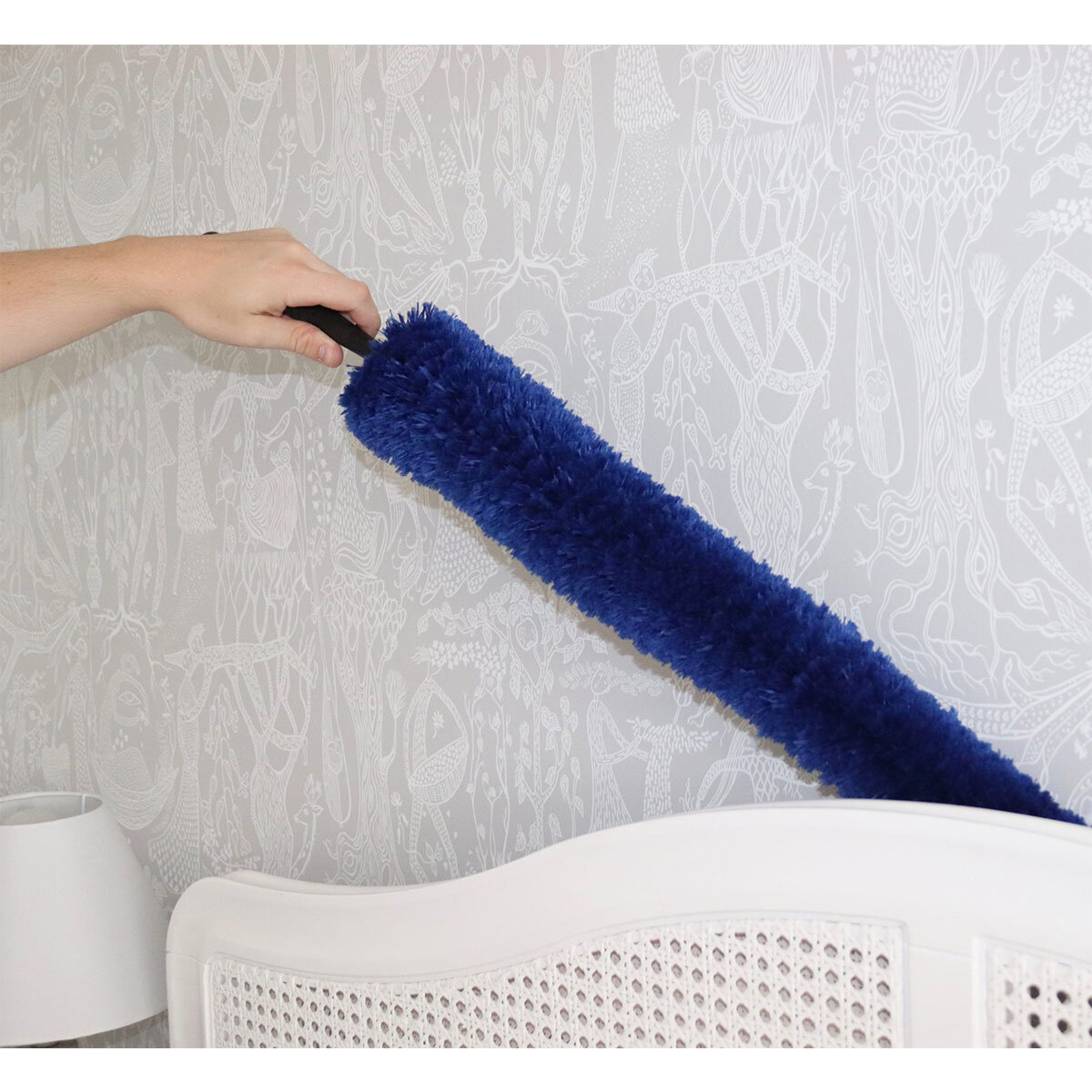 Lifestyle image of duster being used to clean