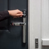 Lifestyle image of door handle installed in door