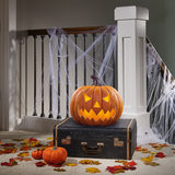 Jack O lantern pumpkin halloween decoration outside on natural background