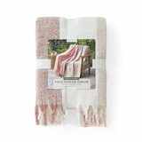 Folded Pink  Mohair Faux Fur throw, with outer packaging shown