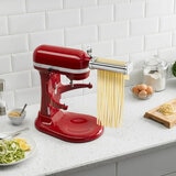 Lifestyle image of pasta roller and cutter set attached to the stand mixer Lifestyle image of pasta roller and cutter set attached to the stand mixer