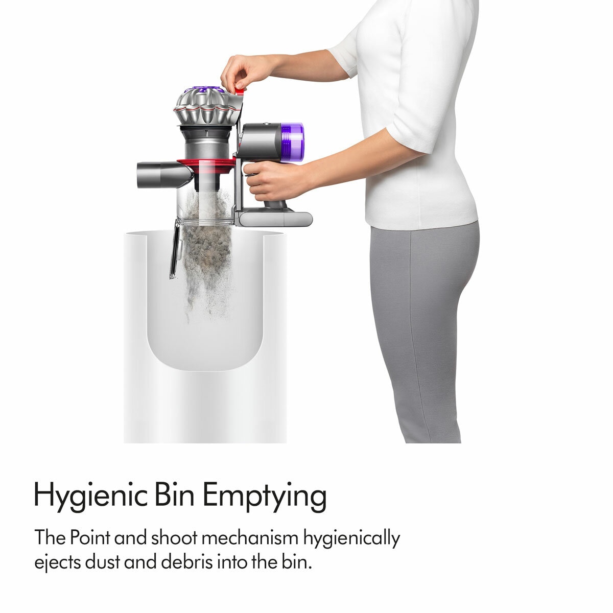 Lifestyle image of Dyson Car+Boat Handheld Vacuum showing hygienic bin emptying