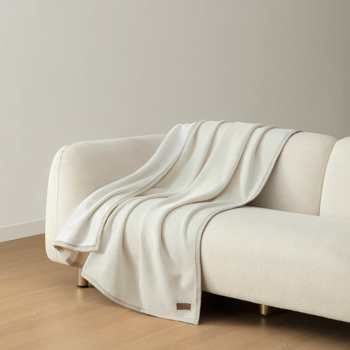 Ivory throw on sofa