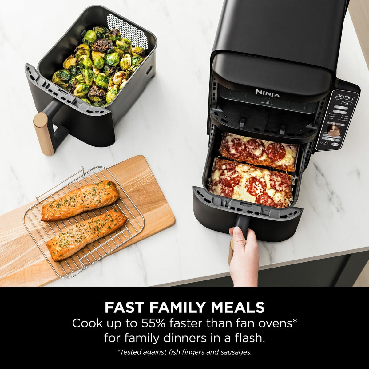 Lifestyle image of Ninja Double Stack 9.5L Air Fryer cooking family meals