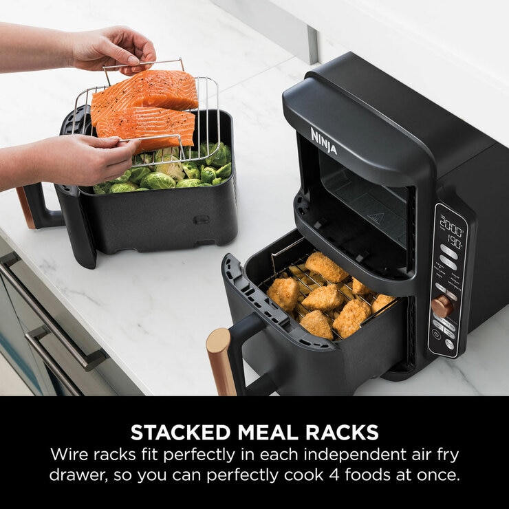 Lifestyle image of Ninja Double Stack 9.5L Air Fryer with stacked meal racks