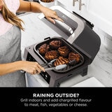 Lifestyle image showing grilling indoors Lifestyle image showing grilling indoors