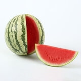 WHOLE SEEDLESS WATERMELON WITH PORTION CUT OUT