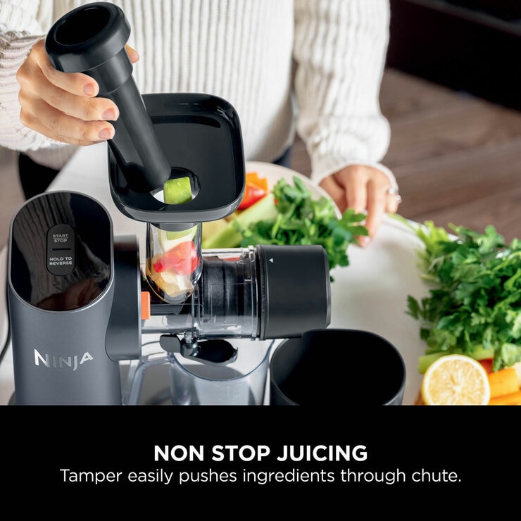 Lifestyle image of Ninja Cold Press Juicer showing total pulp control