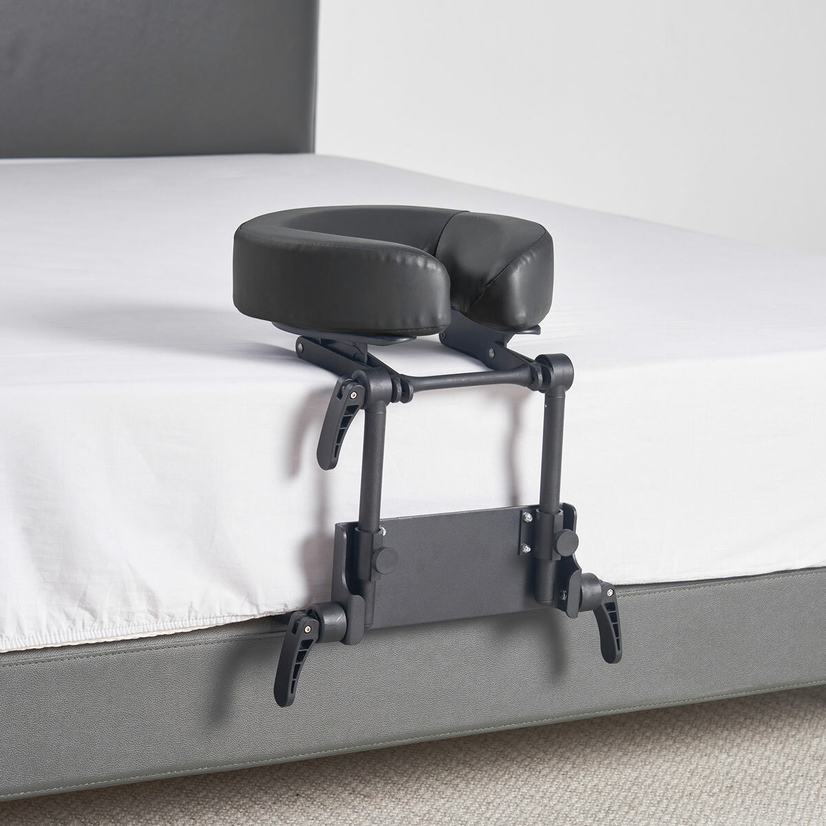 Lifestyle image of the headrest attached to a mattress