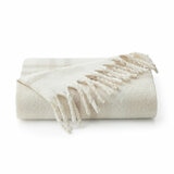 Folded beige Faux Mohair Throw, showcasing fringed border and soft texture