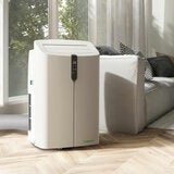 Lifestyle image of air conditinoer in living room Lifestyle image of air conditinoer in living room