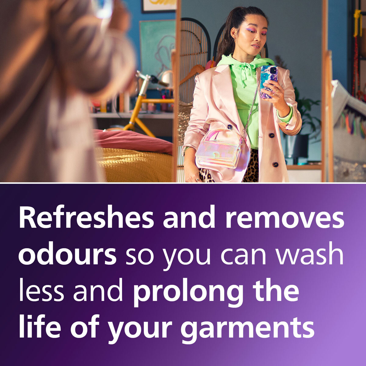 Image of Philips Handheld Steamer describing how it refreshes clothing