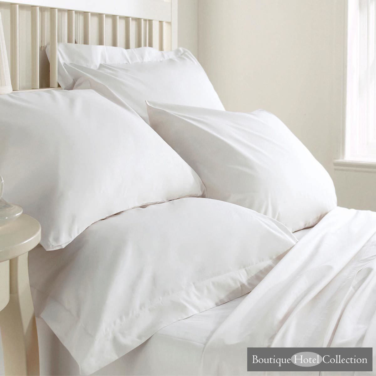 Set includes one fitted sheet, one flat sheet, and a pair of pillowcases. costco