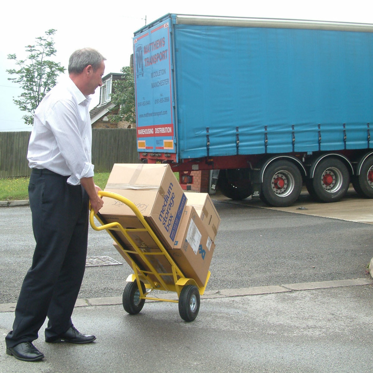 Olympia Tools Yellow Commercial Grade 800 lb/365 kg Capacity Hand Truck with Stair Gliders