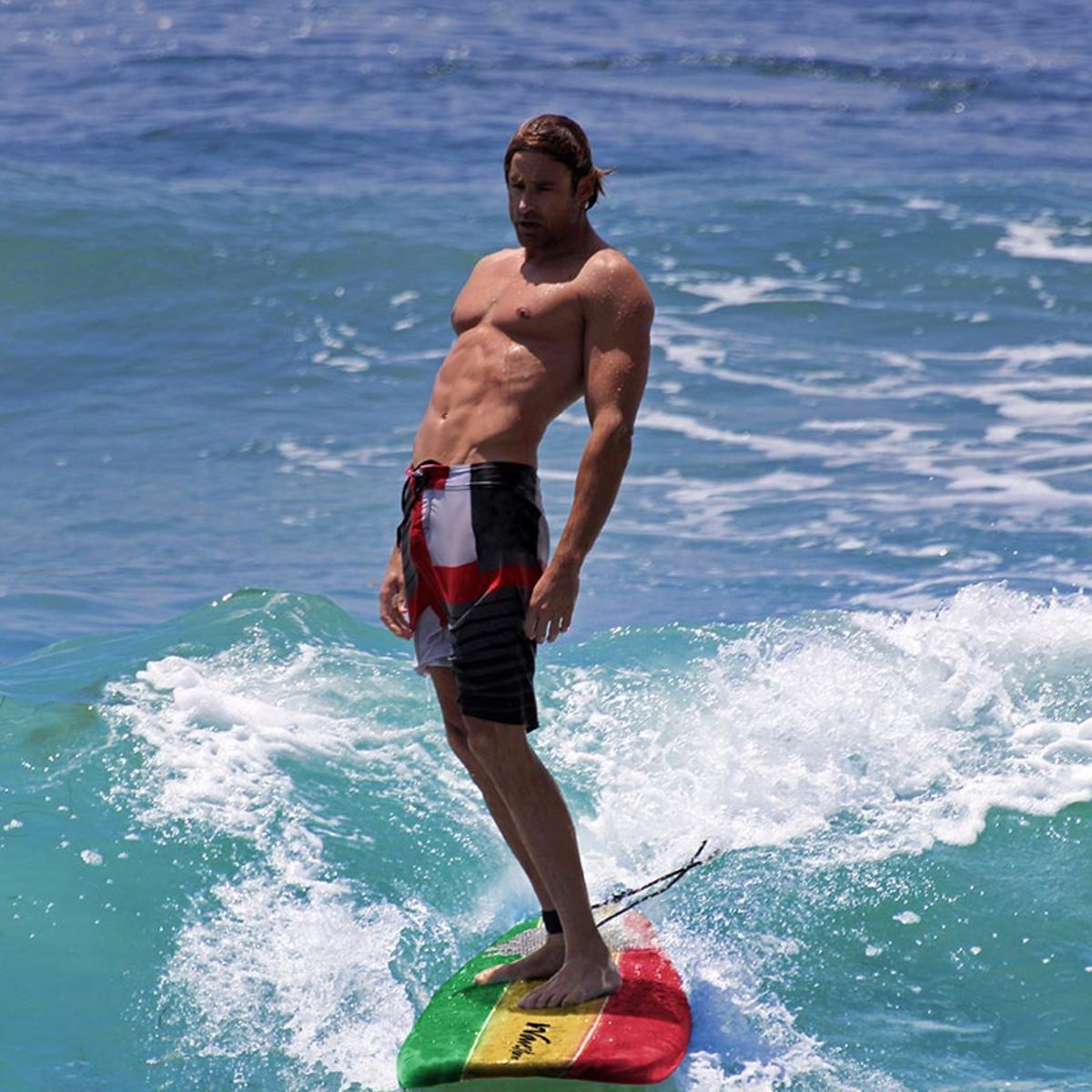 Wavestorm 8ft Classic Surfboard in Yellow, Red and Green Stripe